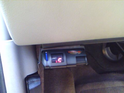 1979 Ford F-150 - Close-up of a trailer brake controller mounted under the dashboard.