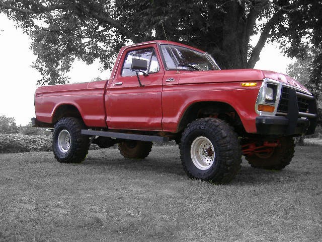 Red 1979 Ford F-150 pickup truck, 3/4 front view