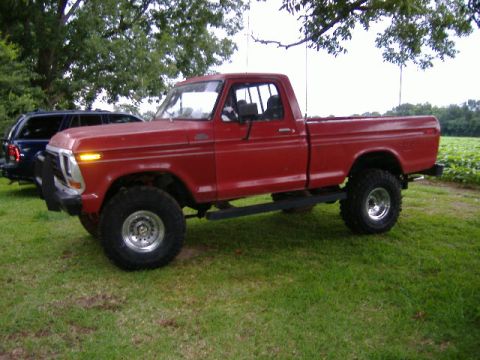 1979 Ford F-150 - This 1979 Ford F-150 pickup truck is shown from a 3/4 front angle, parked outdoors.