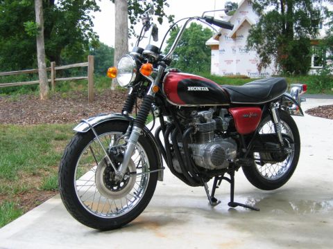 1985 Ford Crown Victoria LTD - 1975 Honda CB500 motorcycle with red and black paint scheme.