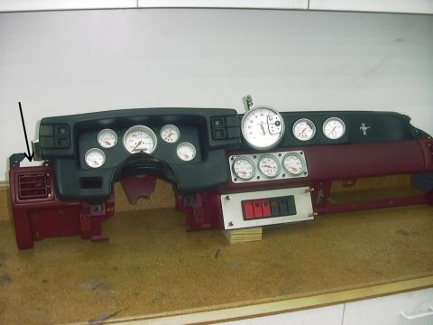1990 Ford Mustang - Dashboard assembly with aftermarket gauges and switches, likely for a performance vehicle.