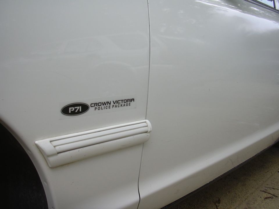 White Crown Victoria Police Package fender emblem