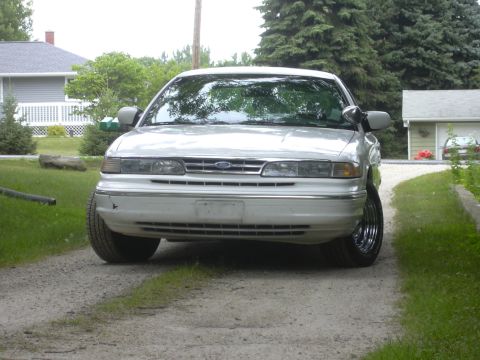 1997 Ford Crown Victoria - This 1997 Ford Crown Victoria is seen from the front, parked on a gravel driveway.