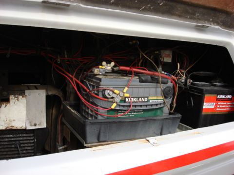 1983 Ford Bronco - here are the 2 batteries. It is a wiring mess. i going to clean it up as i do the fan swap.