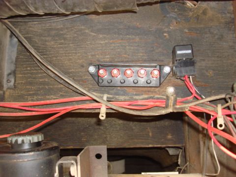 1983 Ford Bronco - i used 5/16 tec screws to hold the power tap to the firewall.