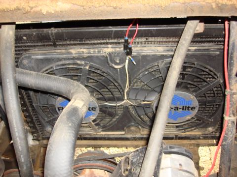 1983 Ford Bronco - this is the old fan. one works the other lost its main bearing. the power feed wires are too small. we will fix this.
