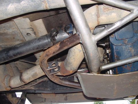 1979 Ford Bronco - A close-up view of the undercarriage reveals a custom traction bar modification.