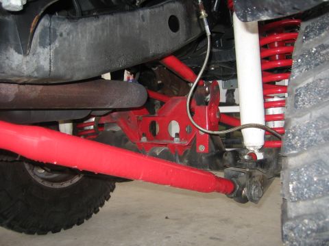 2001 Jeep Wrangler - Close-up view of the modified suspension system of a Jeep Wrangler.