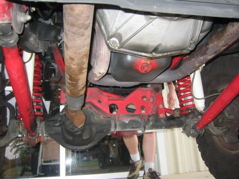 2001 Jeep Wrangler - Close-up view of the undercarriage, highlighting the suspension and drivetrain components.