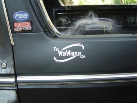 1979 Ford Bronco - A dark vehicle side panel displays "The WebWheeler.com" and "Bronco" stickers, with a Supermotors.net watermark at the bottom.