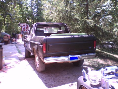 1979 Ford Bronco - Rear view of a 1978 Ford Bronco, showing its removable top and chrome bumper.