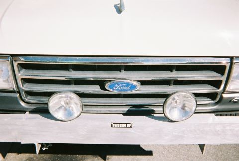 1991 Ford Bronco - Front view of a 1991 Ford Bronco showing the grille, headlights, and fog lights.