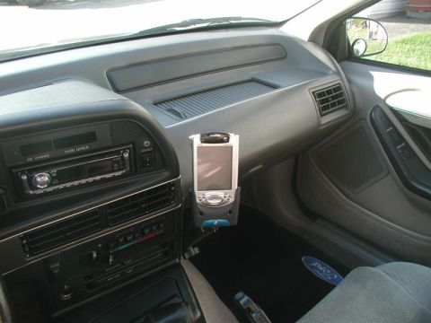 1990 Ford Thunderbird - Interior view of a 1990 Ford Thunderbird, highlighting the dashboard and a mounted PDA.