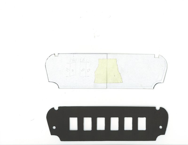 Paper layout template above finished six-opening rocker switch panel