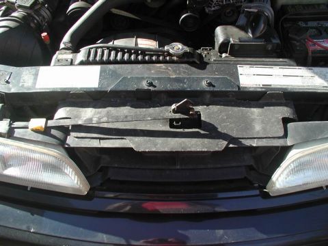1990 Ford Thunderbird - Front view of a 1990 Ford Thunderbird, showing the engine bay and grille area.