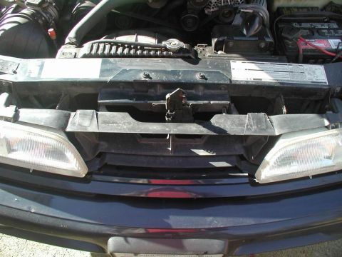 1990 Ford Thunderbird - Front view of a 1990 Ford Thunderbird showing the grille, headlights, and engine bay.