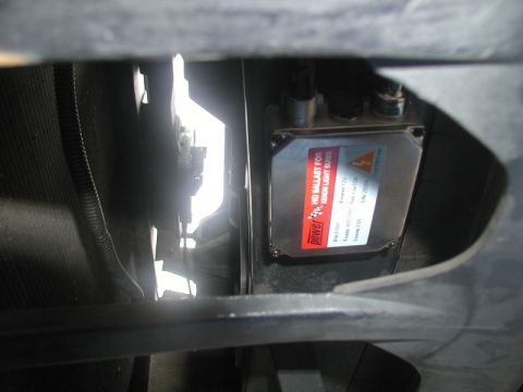1990 Ford Thunderbird - Close-up of an aftermarket HID ballast, not a 1990 Ford Thunderbird.