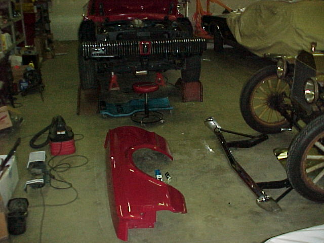 With the grille in place the fenders can go on. I installed the NOS GT emblem first.