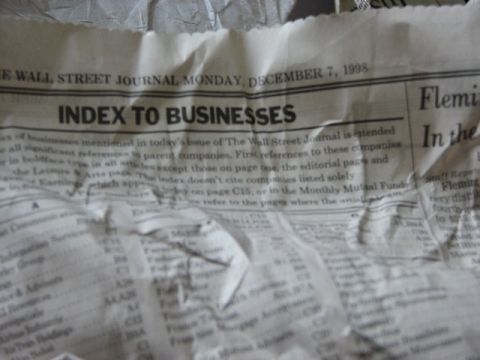 1991 Ford Bronco - A close-up of The Wall Street Journal from Monday, December 7, 1998, the "Index to Businesses" section.