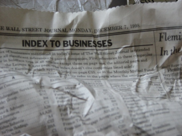 Wall Street Journal dated December 7, 1998, with "Index to Businesses" headline