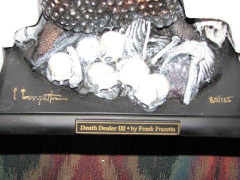 1991 Ford Bronco - This sculpture, titled Death Dealer III by Frank Frazetta, is numbered 80 out of 125 and features a macabre scene with skulls and bones.
