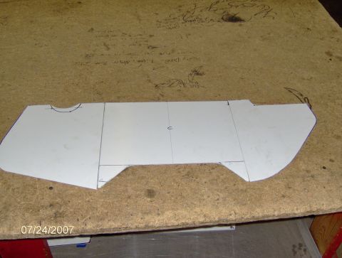 1978 Ford Bronco - A paper template is laid out on a cork board, showing cut lines and measurements.