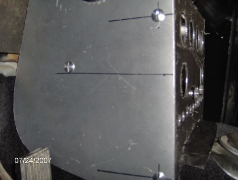 1978 Ford Bronco - Custom metal panel with scribe lines and multiple drilled holes, likely for a vehicle interior modification.