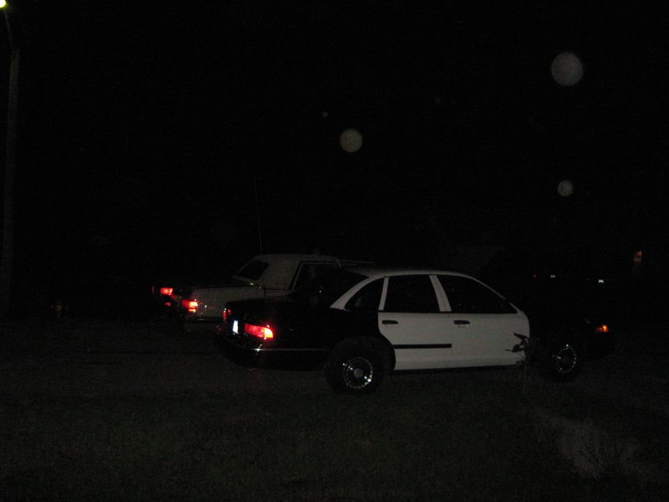 1988 Mercury Grand Marquis side view, two-tone black and white