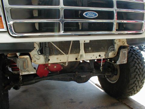 1996 Ford Bronco - Front view of a 1996 Ford Bronco showing the grille, radiator, and suspension system.