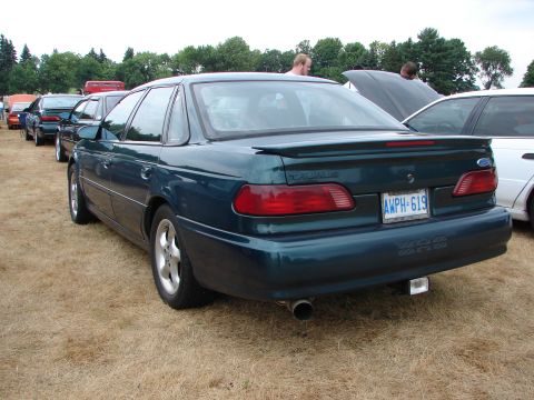 1993 Ford Taurus - Rear view of a 1993 Ford Taurus SHO at a car show.