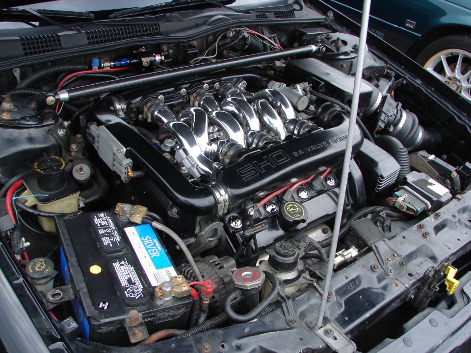 1993 Ford Taurus SHO engine with chrome intake runners and "SHO 24 VALVE DOHC" text