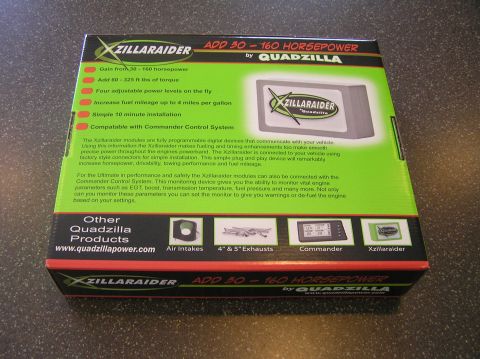 2000 Ford Excursion - This is the packaging for a Quadzilla Xzillaraider performance module, detailing its capabilities and compatible systems.