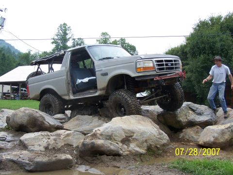 1979 Ford F-150 - A modified Ford Bronco navigates a challenging rock crawling course.