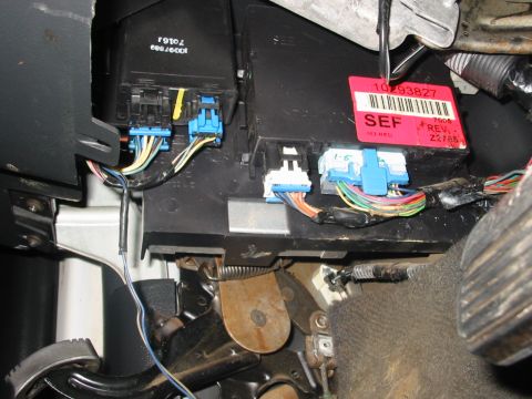 1997 Pontiac Grand Prix - Red label part is 10293827 BCM. Part next to it is the DRL module.