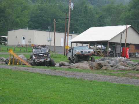 1992 Ford Mustang - Modified trucks tackle a challenging rock crawling obstacle course.