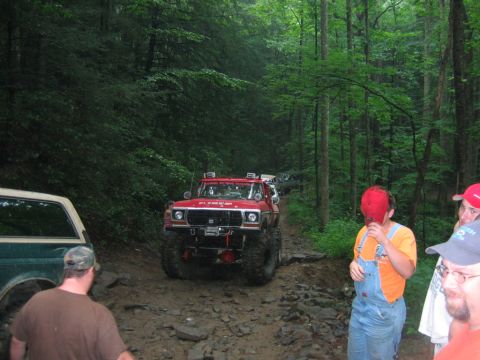 1992 Ford Mustang - Off-roading in a modified 1979 Ford F-150 on a challenging forest trail.
