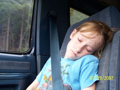 1979 Ford F-150 - A child sleeps soundly in a car, secured by a seatbelt, with a date stamp of 07/29/2007.