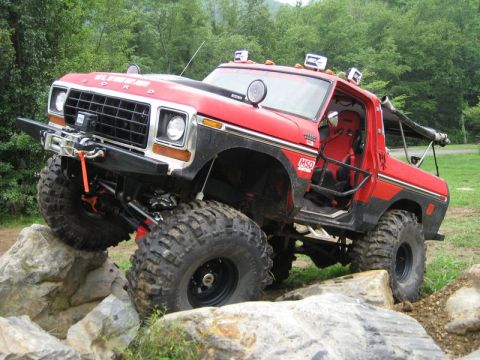 1995 Ford Bronco - This modified Ford Bronco navigates a rocky trail, its off-road capabilities.
