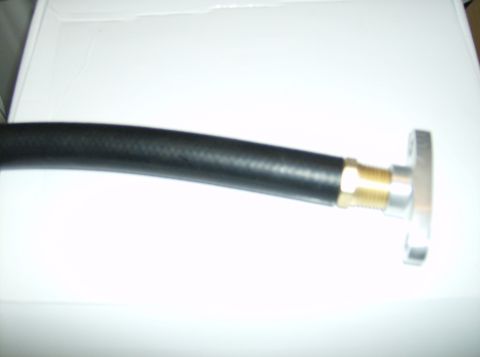 1996 Ford Probe - Automotive hose fitting with braided hose and silver flange.