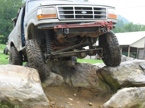 1995 Ford C-350 (Centurion Conversions) - This modified 1995 Ford C-350 is navigating a rocky obstacle course.