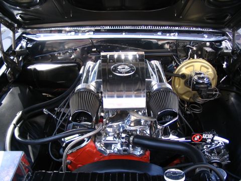 1993 Ford Taurus - Custom engine bay features a polished chrome intake manifold and dual air filters.