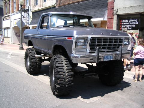 1993 Ford Taurus - This heavily modified 1979 Ford pickup truck features oversized tires and a custom license plate.