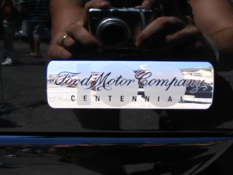 1993 Ford Taurus - A Ford Motor Company Centennial emblem is visible on the back of a vehicle.