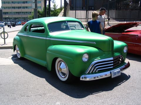 1993 Ford Taurus - A vibrant green coupe hot rod is displayed at the Telephone City Car Show 2007.