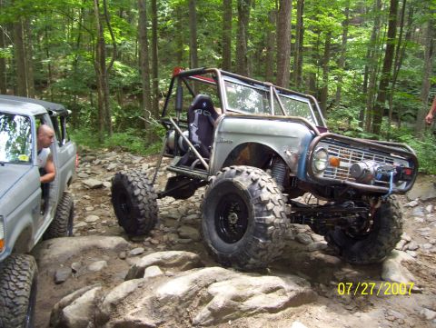 1978 Ford Bronco - Two off-road vehicles navigate a rocky path in a wooded area, with a date stamp of 07/27/2007.