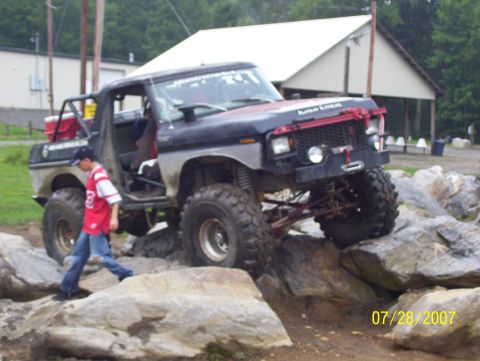 1978 Ford Bronco - Modified 1978 Ford Bronco navigating a rocky obstacle course.