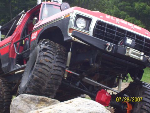 1978 Ford Bronco - This heavily modified 1978 Ford Bronco is shown tackling a rocky off-road course.