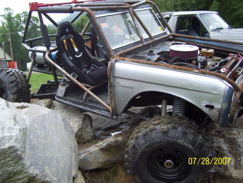1978 Ford Bronco modified for off-roading with roll cage and racing seats