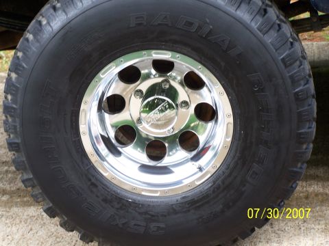 1979 Ford F-150 - Close-up of a chrome wheel and tire assembly, with the date 07/30/2007 visible in the corner.