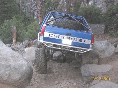 1994 Ford Bronco - Modified Chevrolet pickup truck navigating a rocky off-road course. Date stamp: 07/18/2007.